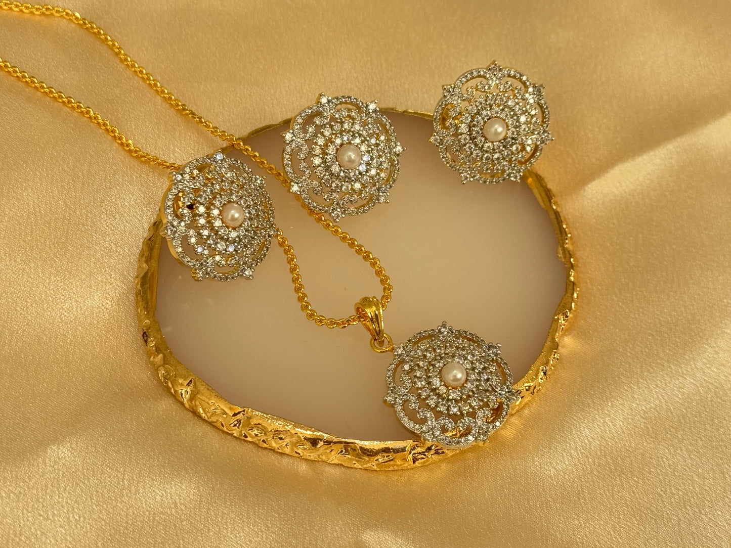 American diamond gold plated pendant set with matching ring and a complimentary chain