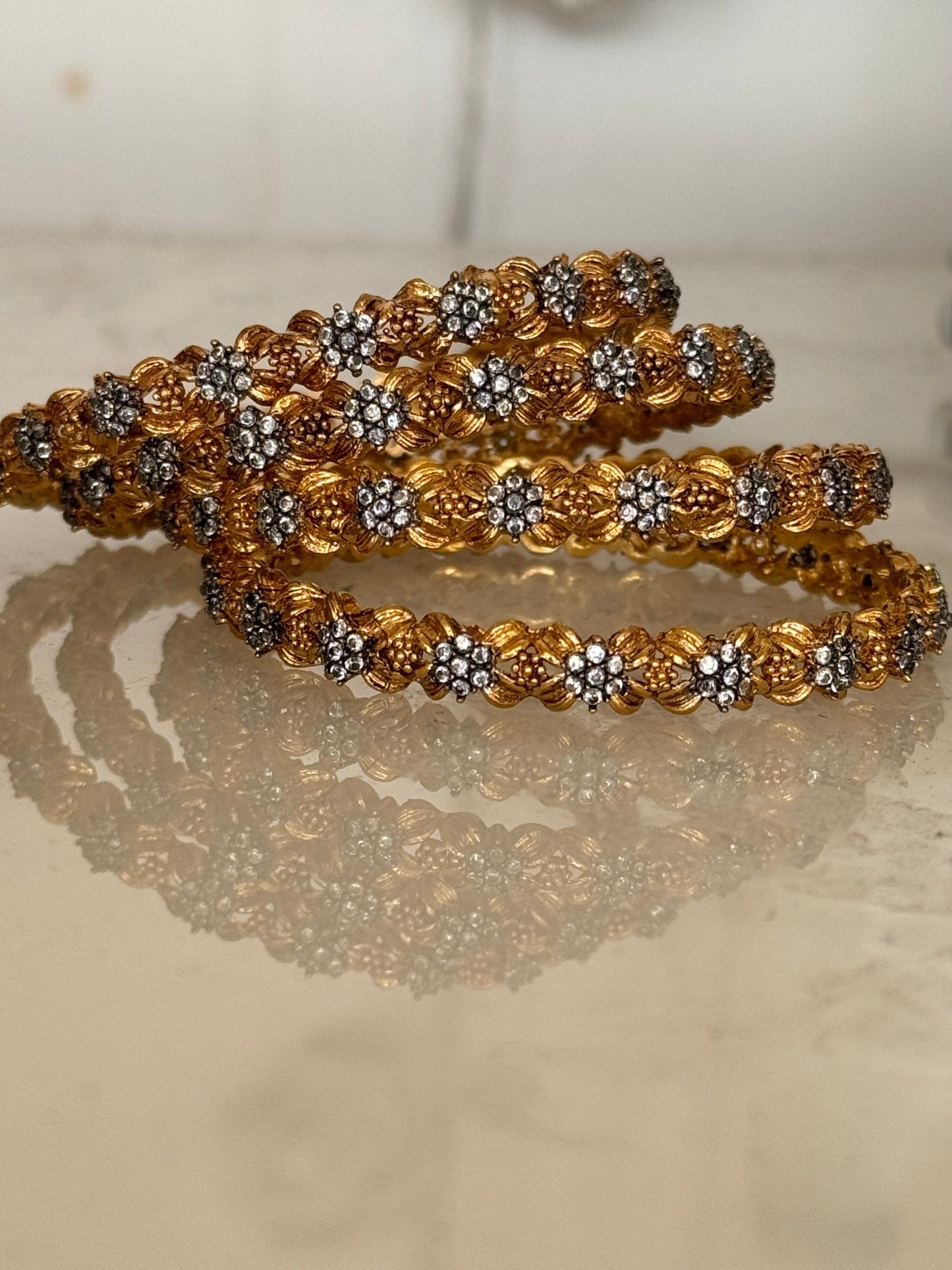 6 Pair of Gold Plated Bangles