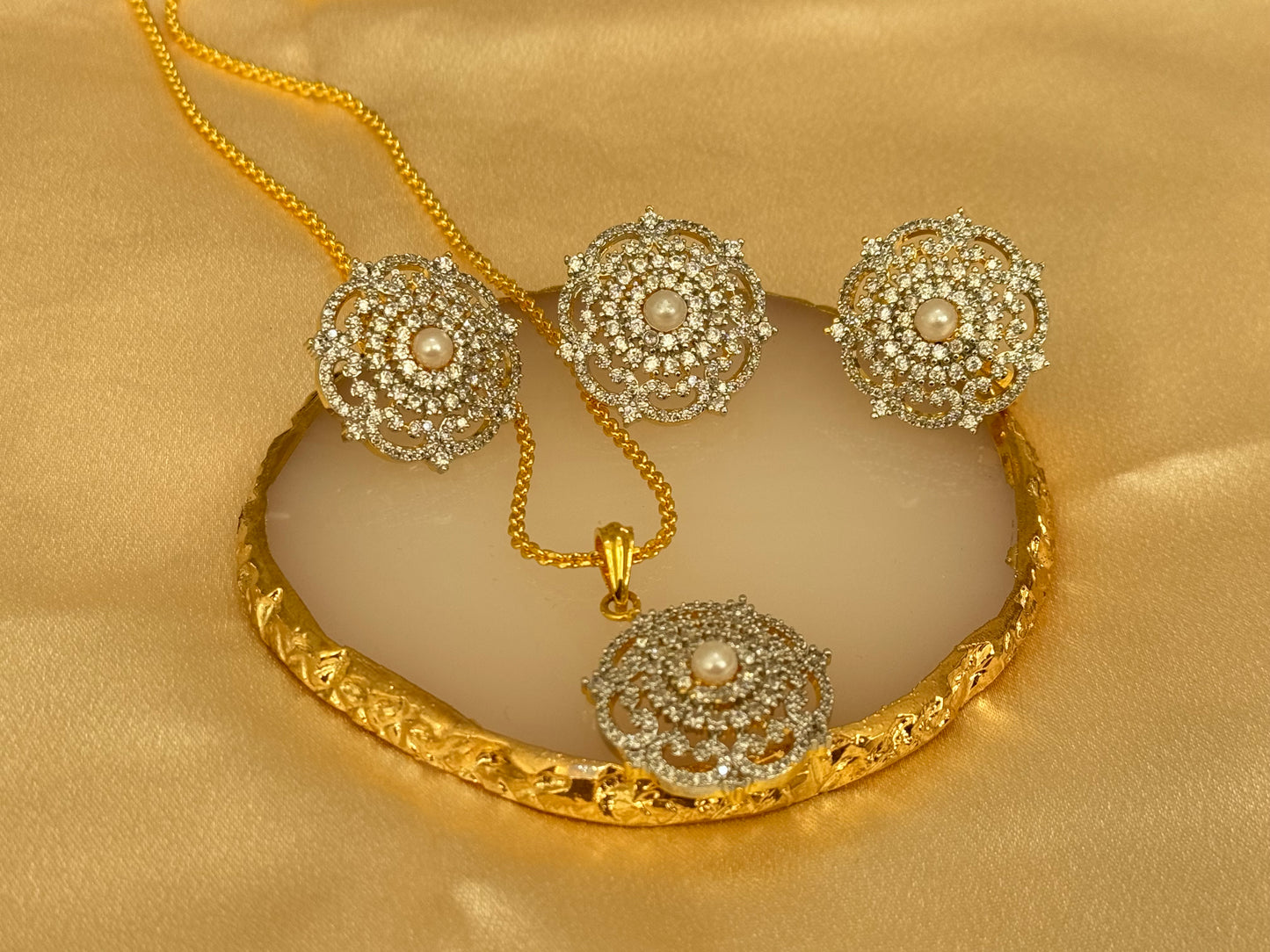 American diamond gold plated pendant set with matching ring and a complimentary chain