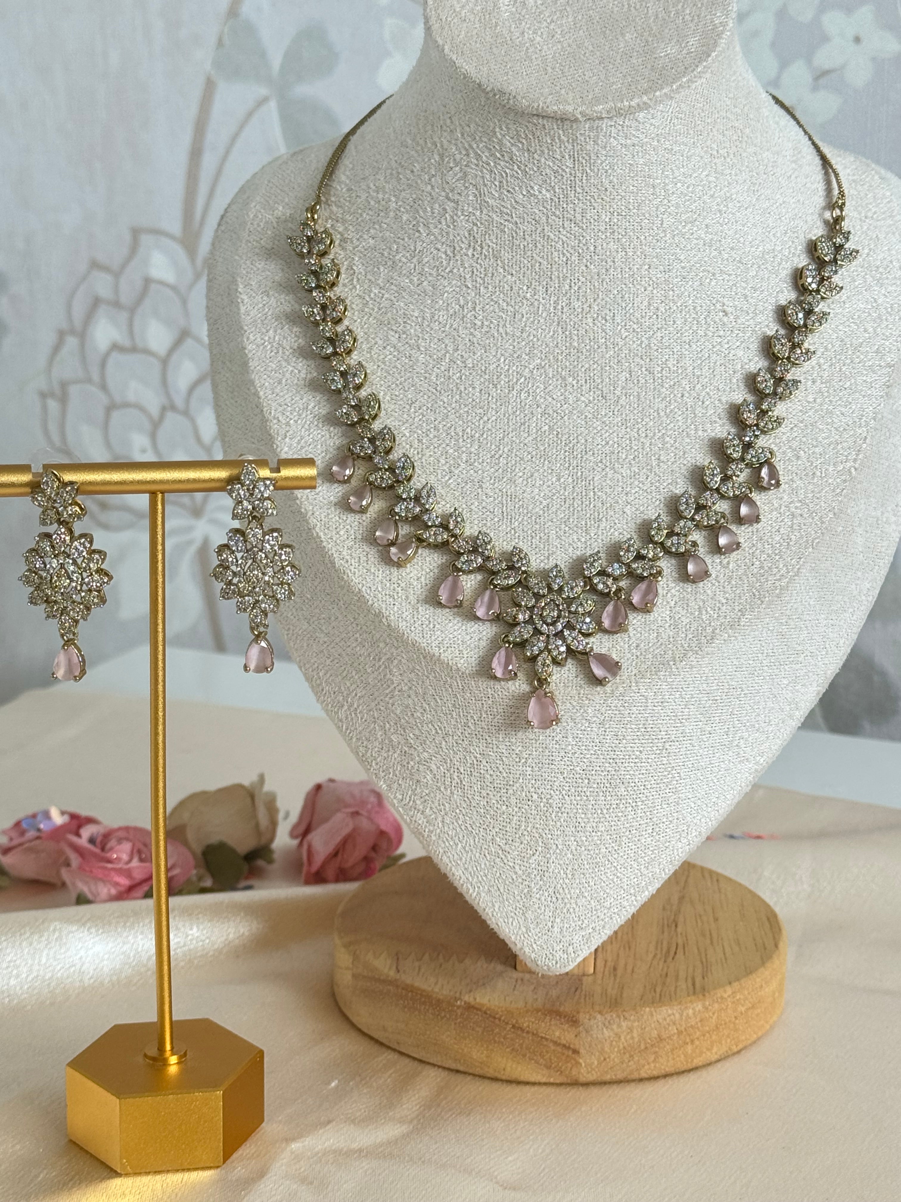 Modern Sleek Cubic zirconia necklace set | Pink and gold polish