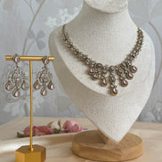 Indian cubic zirconia Necklace set in oxidised gold polish | pink and gold