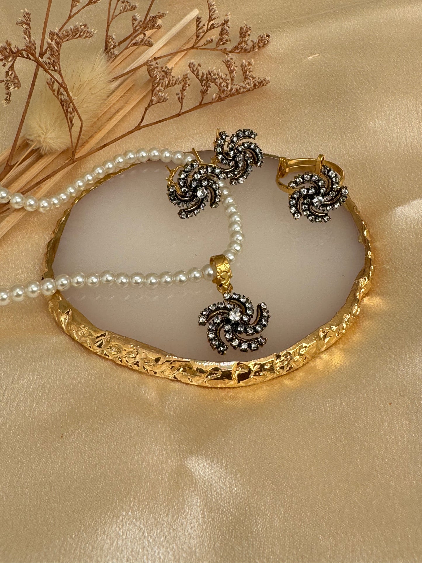 Floral shaped american diamond gold plated pendant set