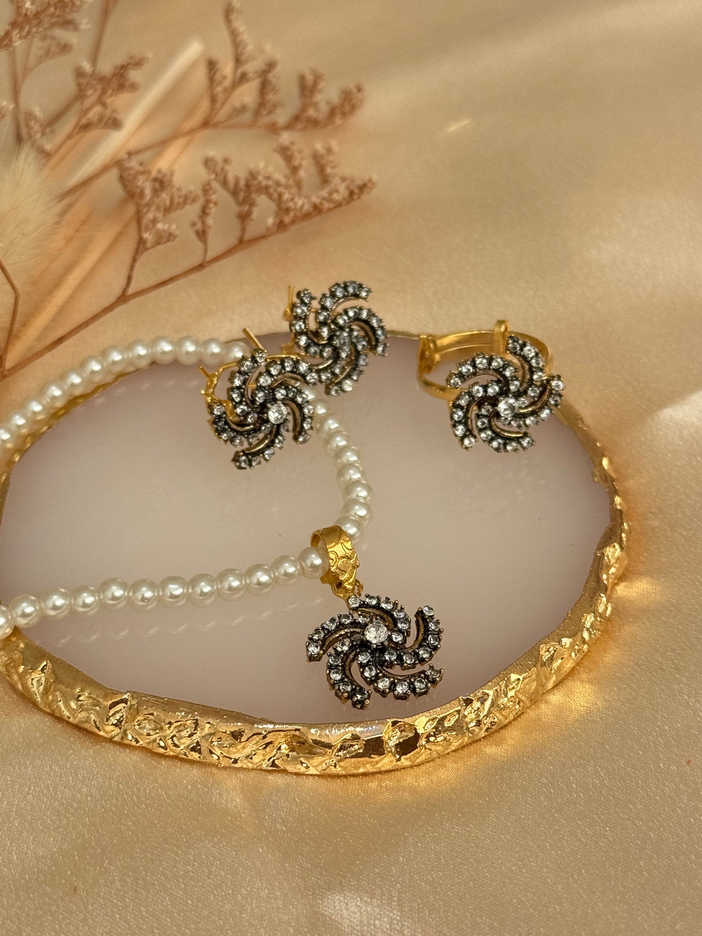 Floral shaped american diamond gold plated pendant set