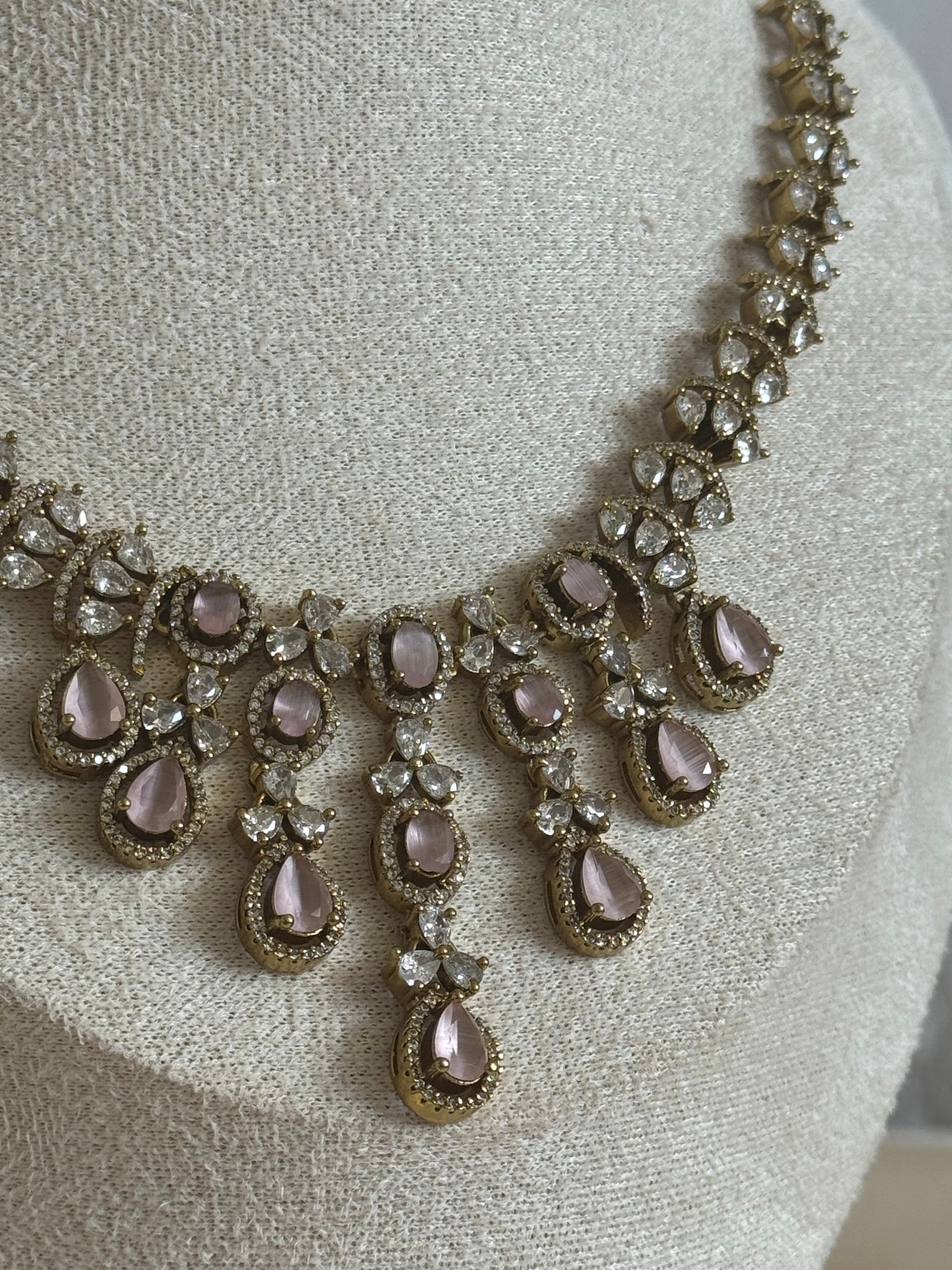 Indian cubic zirconia Necklace set in oxidised gold polish | pink and gold